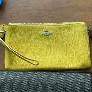 Coach yellow  wristlet/wallet
